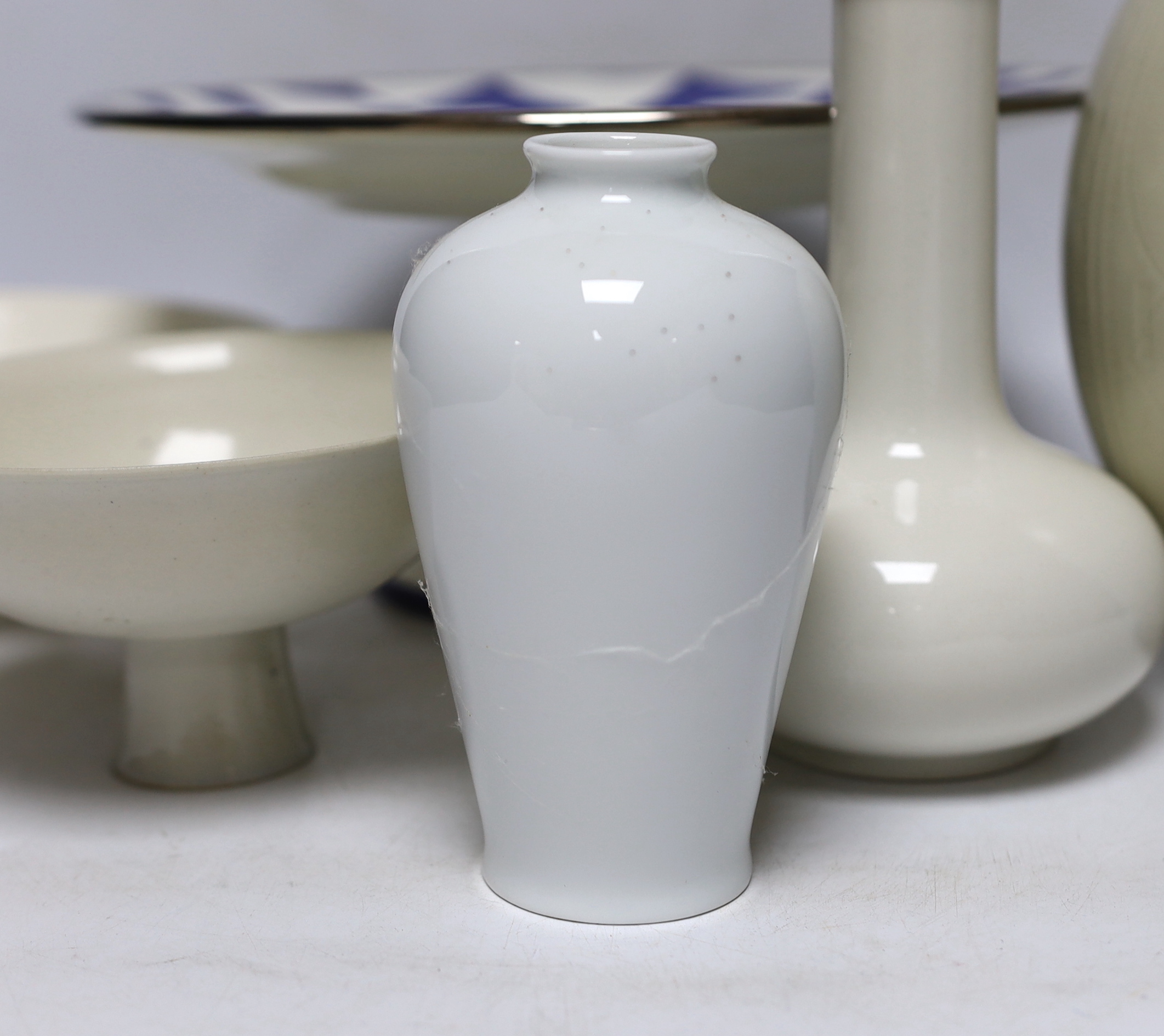 A Danish ovoid vase and other ceramics including a Tiffany & Co. pedestal dish, a Wedgwood bowl, a Copenhagen bottle vase, a Limoges vase and a Chinese stem bowl, tallest 18cm